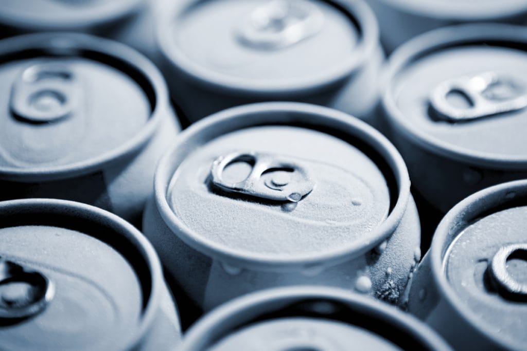 an image of canned beverages, signifying the aluminum industry, one industry affected by US-China Trade.